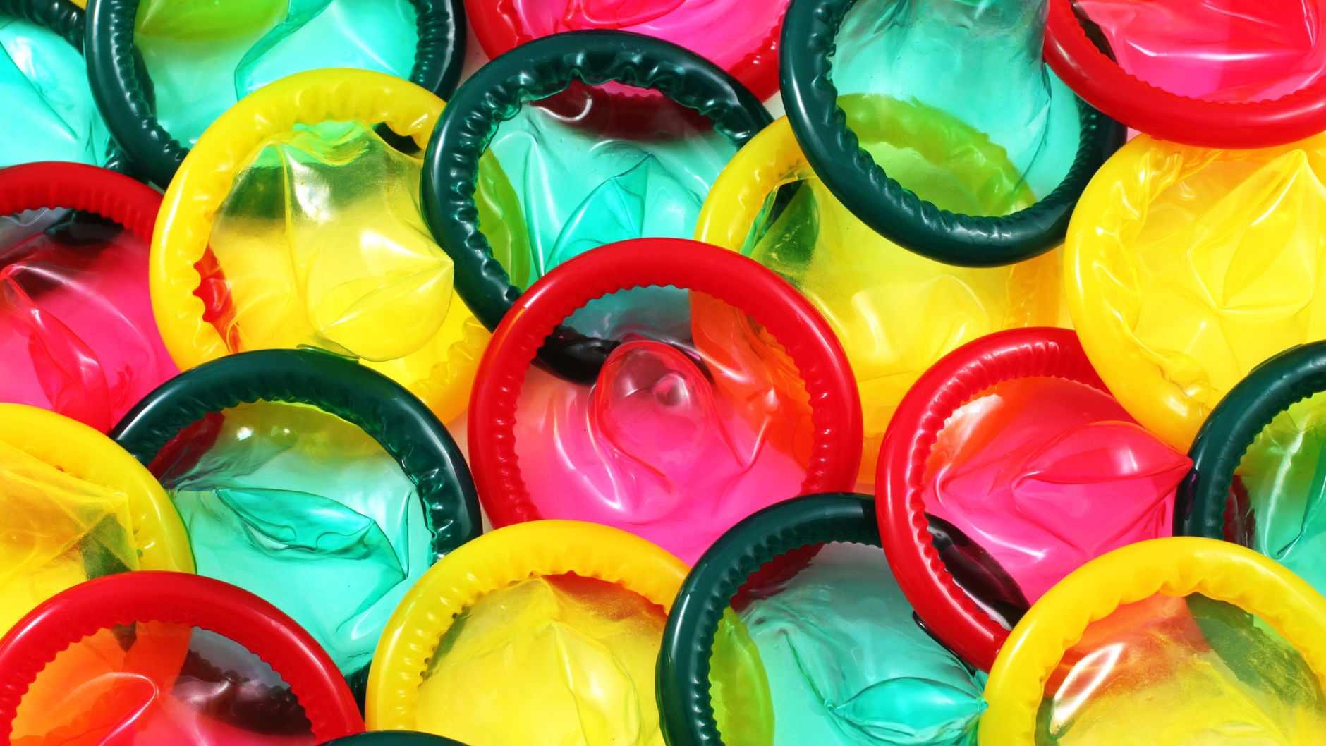 A Close Up Image Of A Multitude Of Colored Condoms16x9web Clinique Cme 